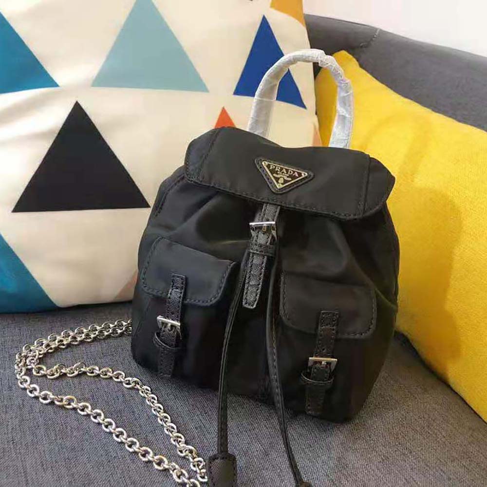 Close-up on silver hardware and zipper of Prada Women Nylon Mini Backpack-Black