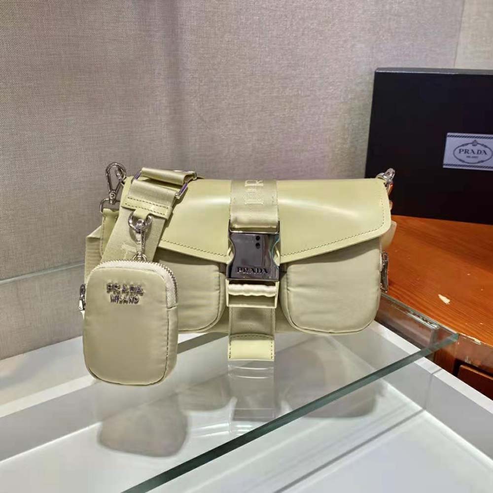 Close-up of silver-tone hardware on Prada Women Pocket Nylon and Brushed Leather Bag