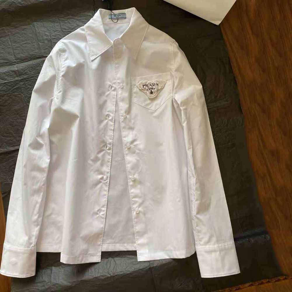 Side angle showing silhouette of Prada Women Poplin Shirt Reveals a Complex Simplicity Constantly