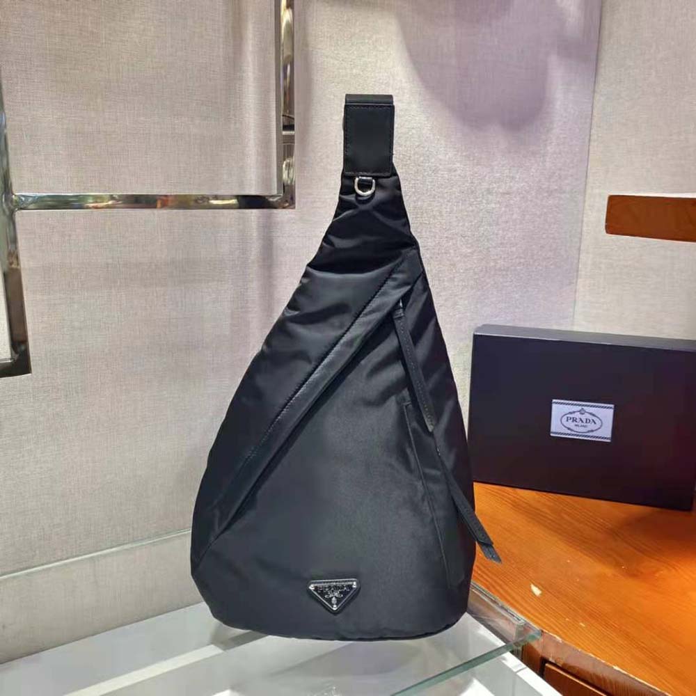 Close-up of silver hardware and Re-Nylon texture on Prada Women Backpack
