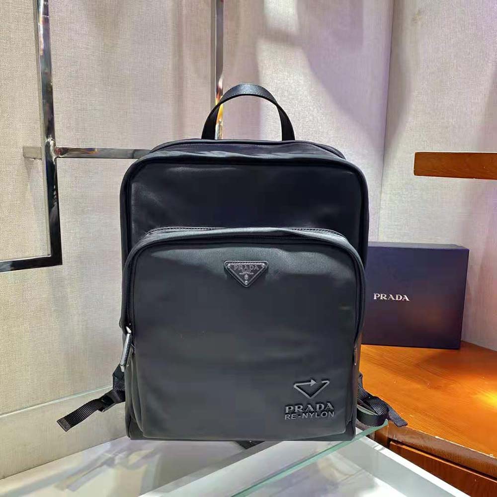 Close-up of silver hardware detail on Prada Women Re-Nylon backpack