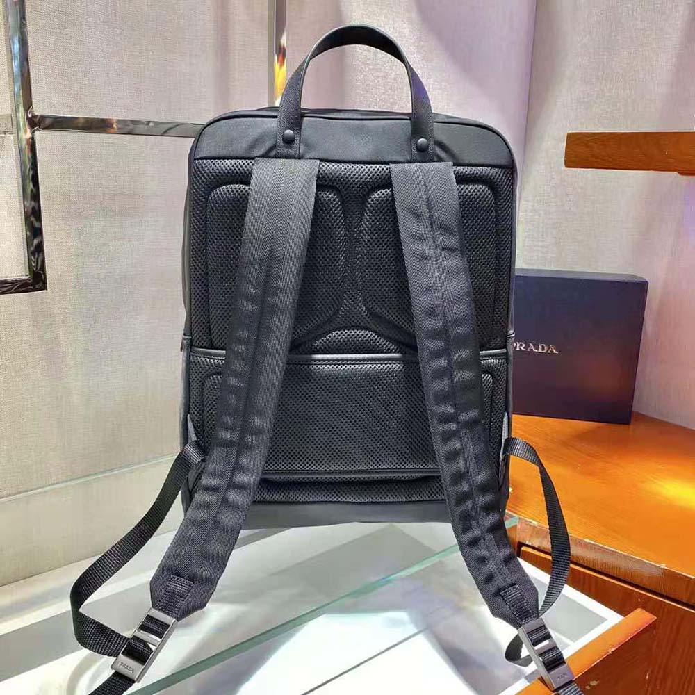 Side angle showing adjustable straps on Prada Women Re-Nylon backpack