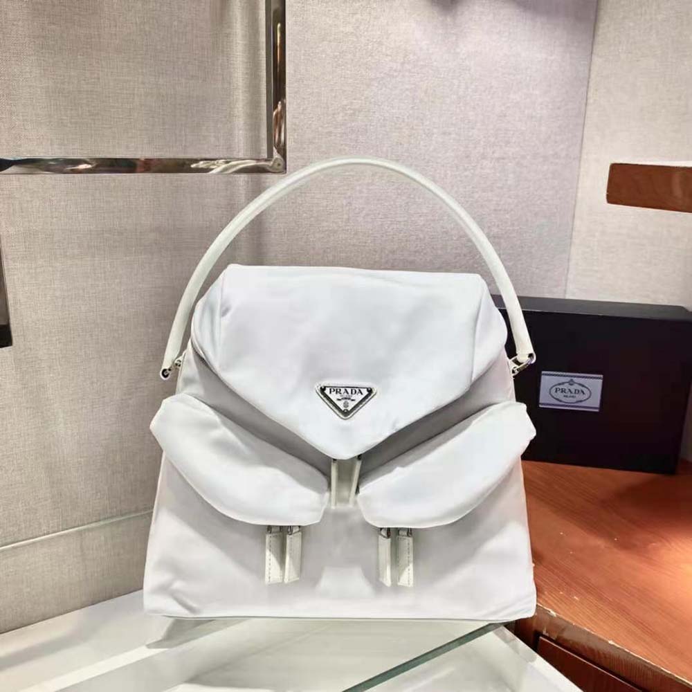 Close-up of silver hardware on Prada Women Signaux Nylon and Leather Hobo Bag-White
