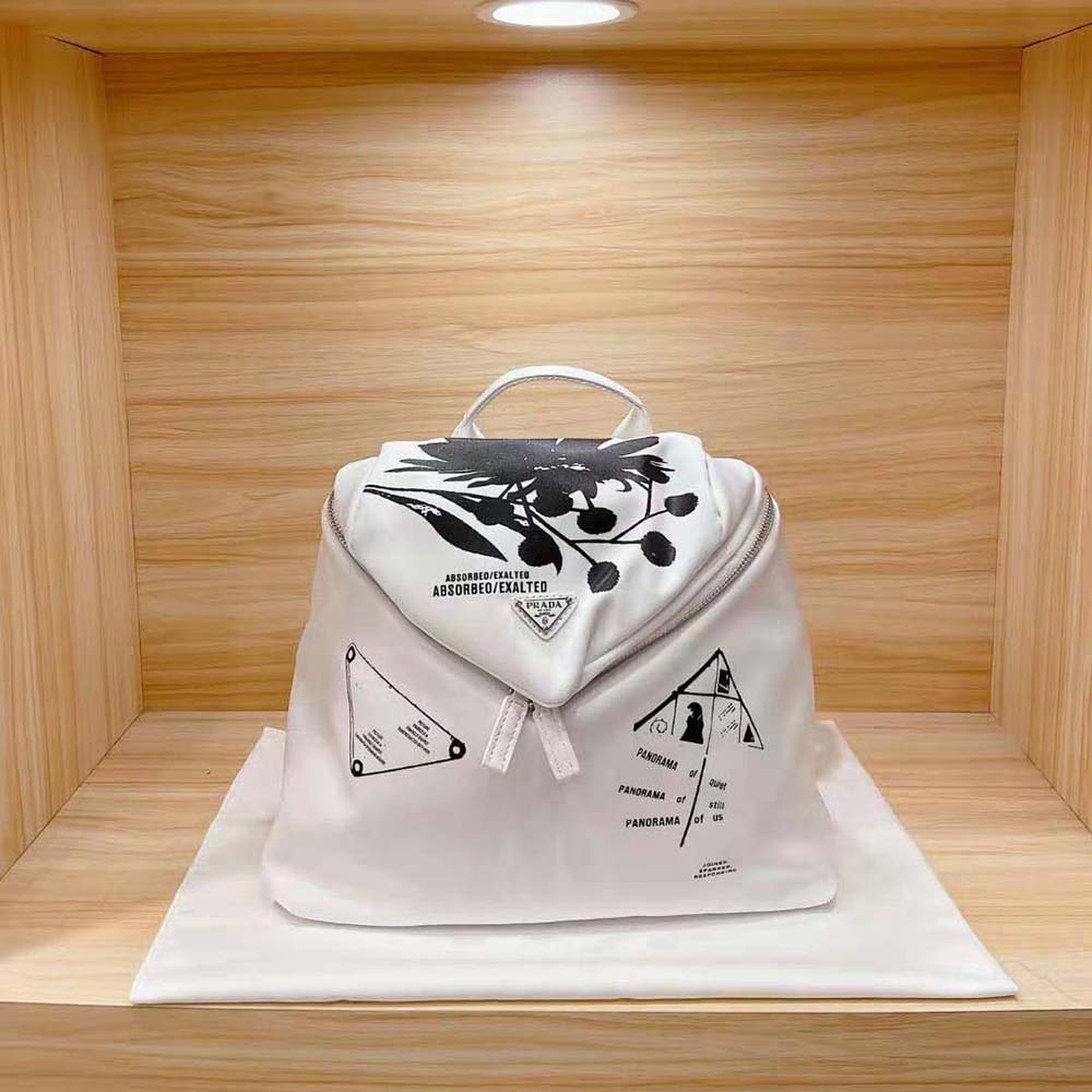 Close-up detail of silver-tone hardware on Prada Women Signaux Printed Nylon Backpack-White