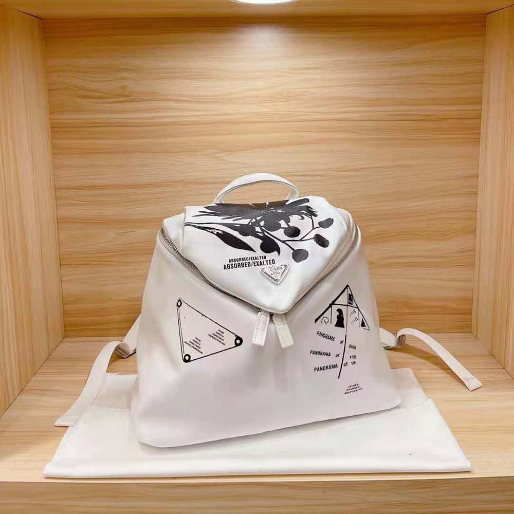 Side angle showing silhouette and straps of Prada Women Signaux Printed Nylon Backpack-White