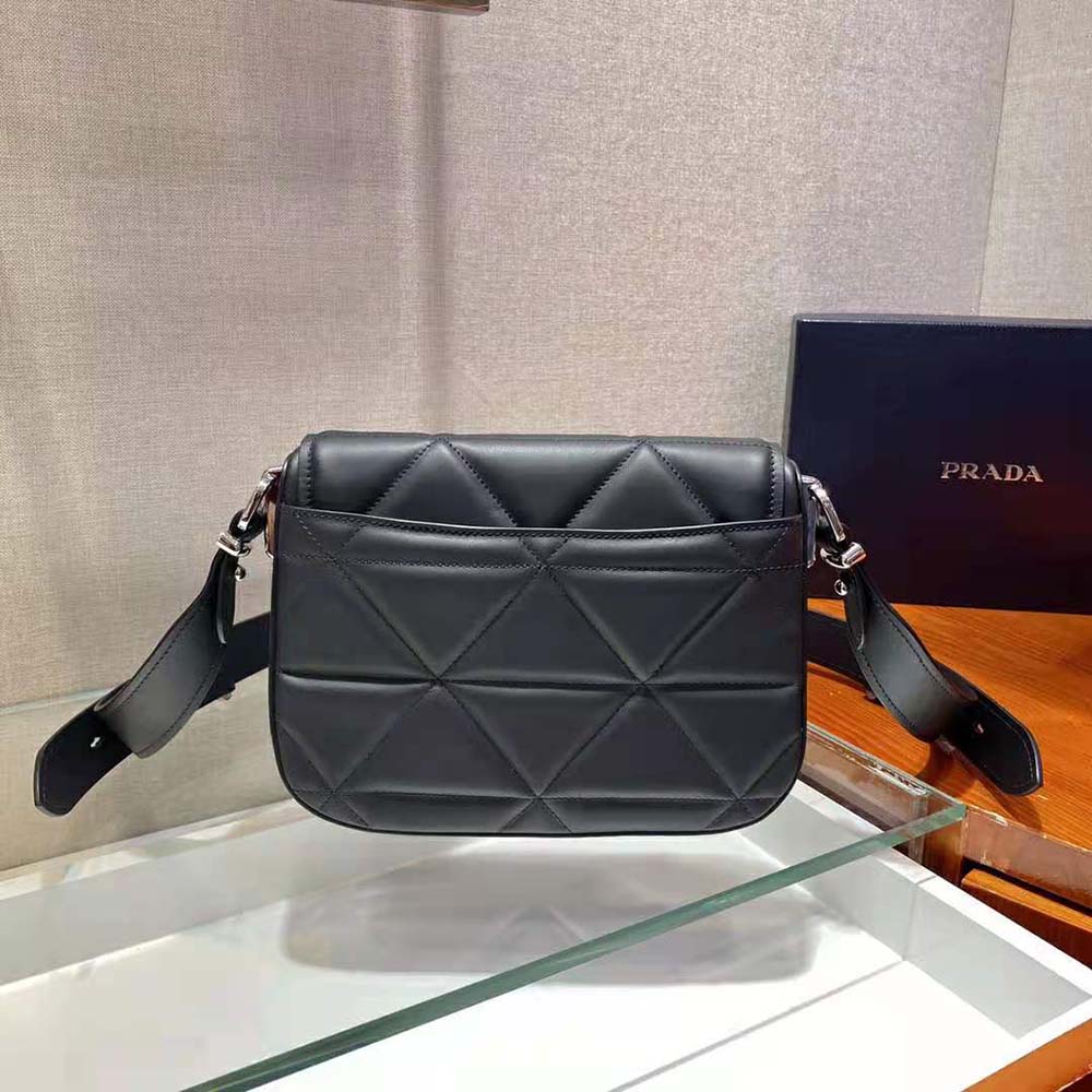Side profile showing silhouette of Prada Women Spectrum Leather Bag-Black