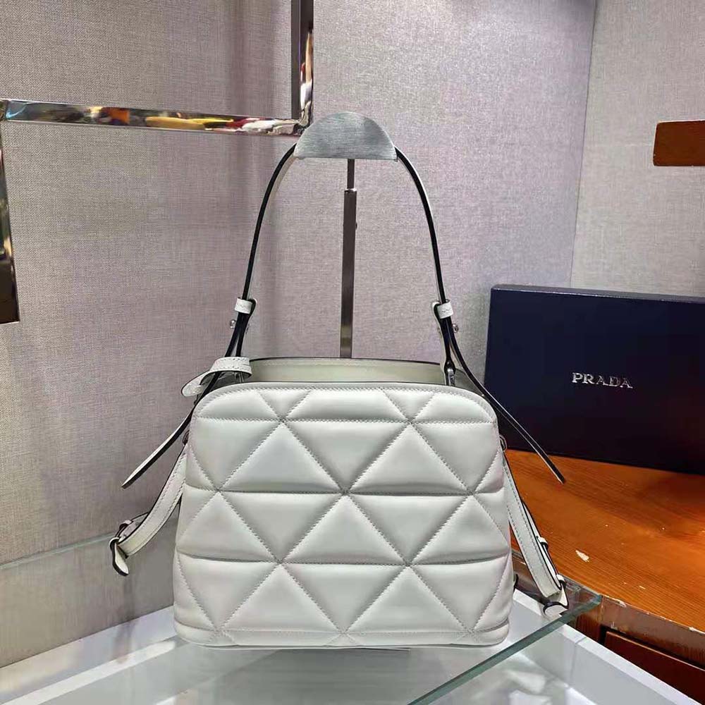 Side profile of Prada Women Spectrum Small Leather Bag-White with strap