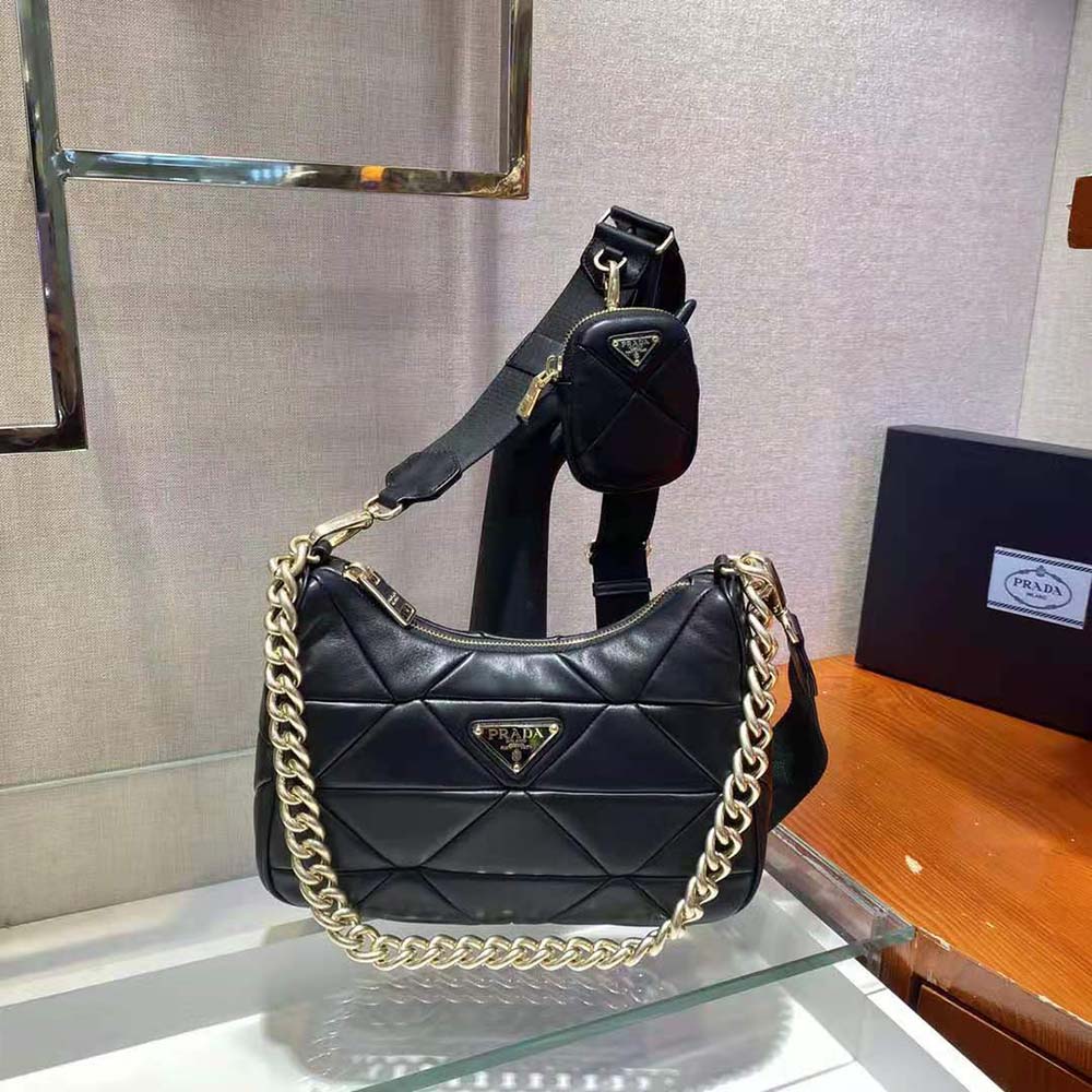 Close-up of black nappa leather patchwork detail on Prada shoulder bag