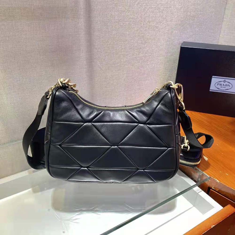 Side profile showing silver hardware on Prada Women System Shoulder Bag