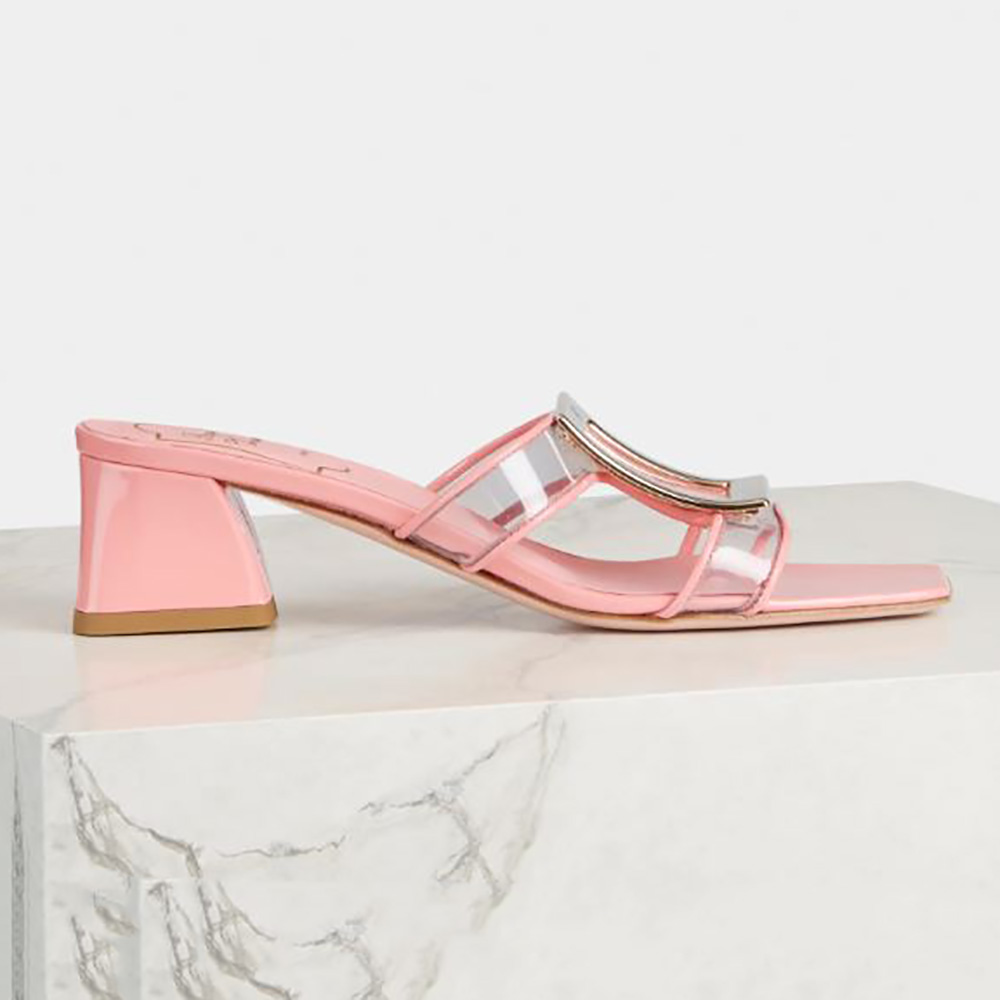 Side view of Roger Vivier Women Bikiviv Metal Buckle Mules in PVC-Pink
