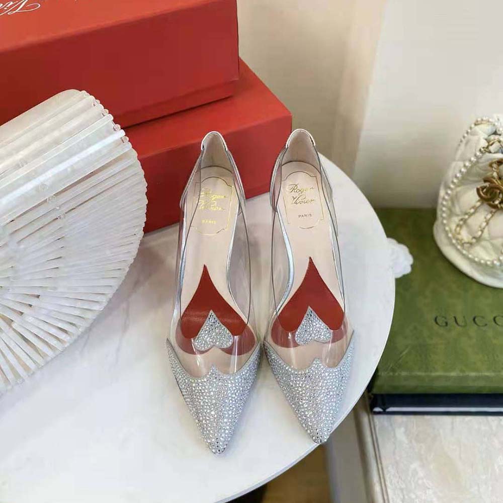 Close-up of signature crystal buckle on Roger Vivier Women I Love Vivier Pumps