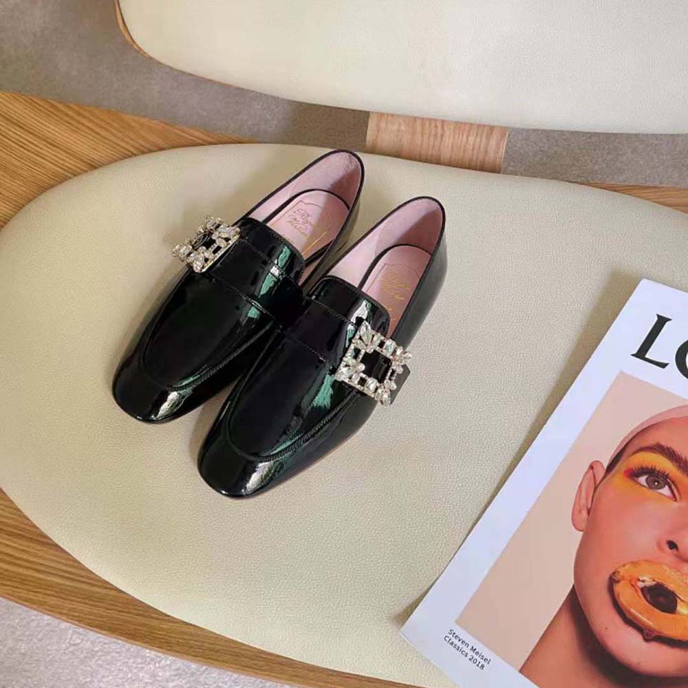 Close-up of signature Mini Broche buckle on Roger Vivier Women loafers