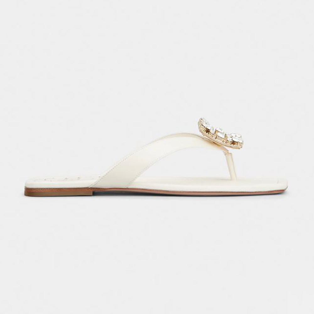 Side view of Roger Vivier Women Mini Broche Vivier Buckle Thong Mules in Leather-White