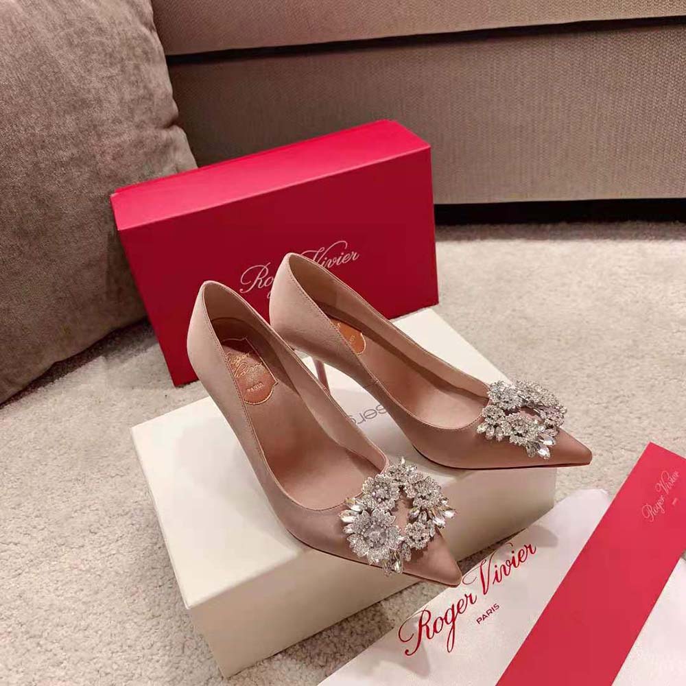 Close-up of signature strass buckle on Roger Vivier Satin-Sandy pumps