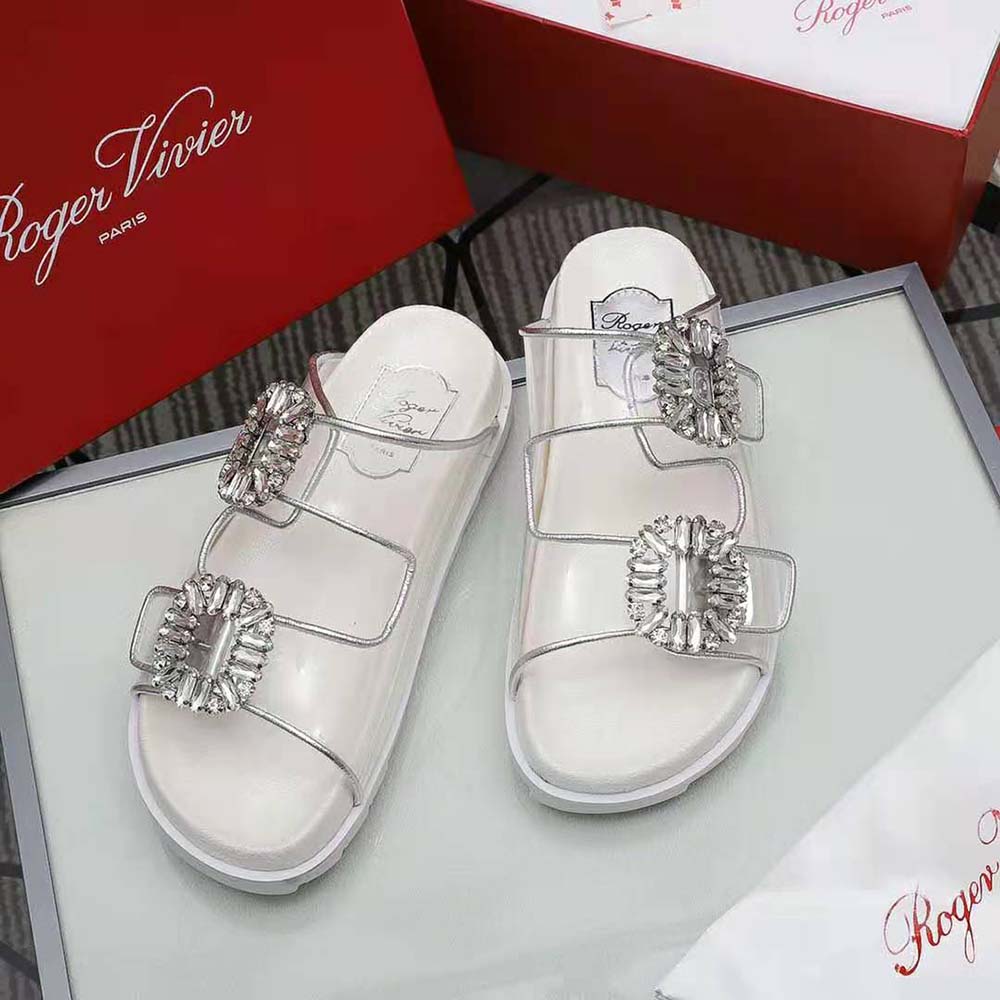 Top view showing transparent white PVC and low heel of Roger Vivier mules