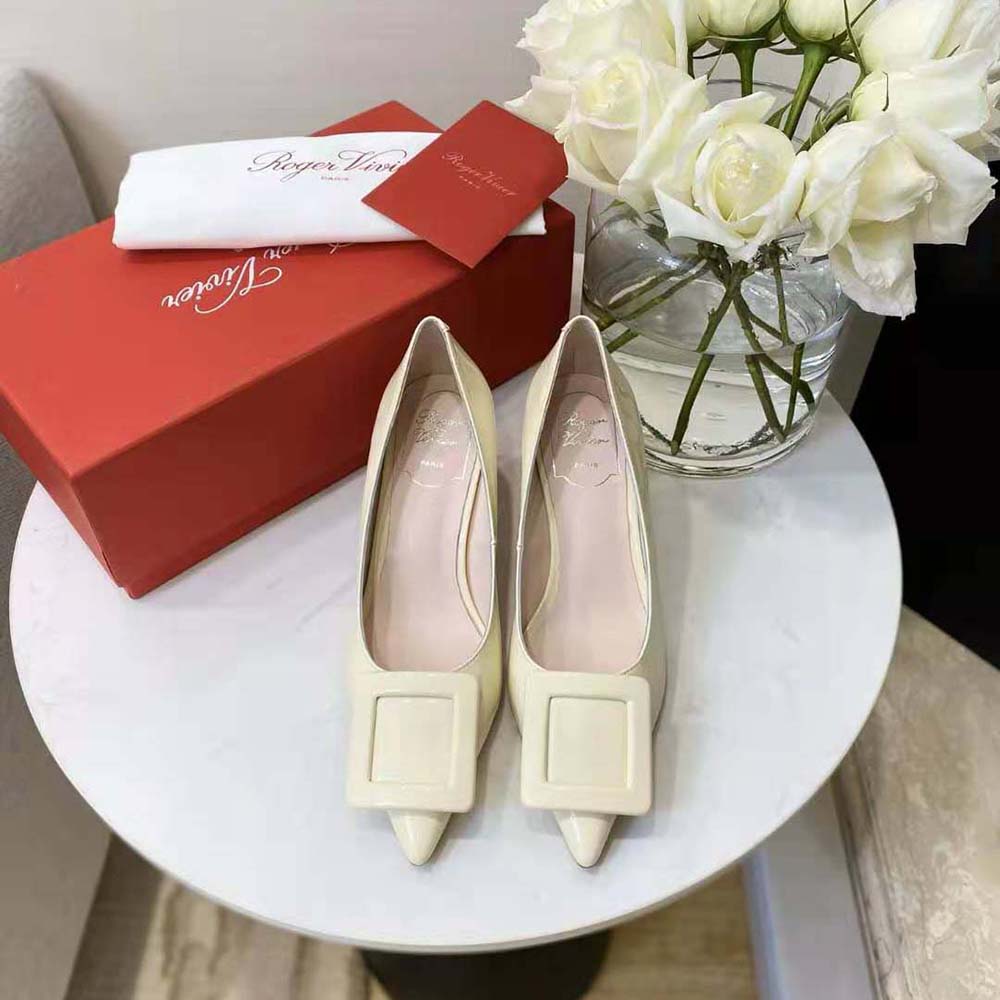 Close-up of signature buckle detail on Roger Vivier Women Viv’ In The City Pumps