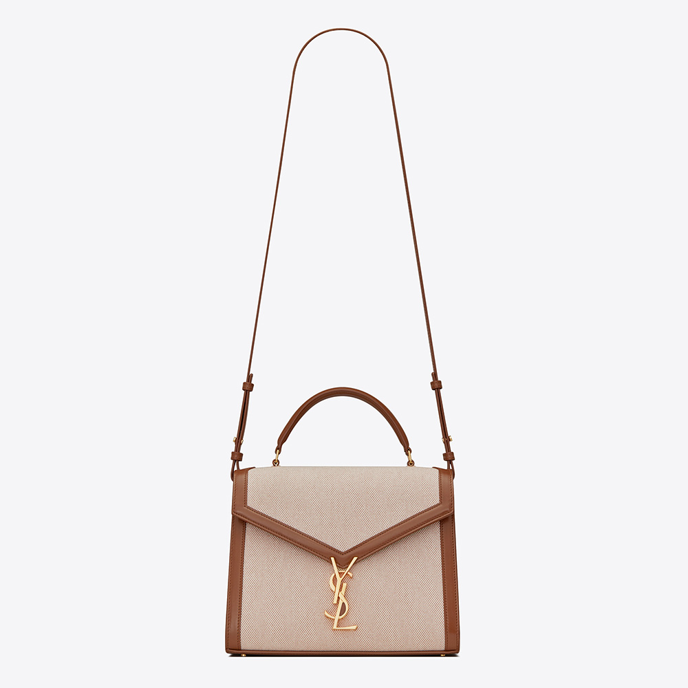 Front angle of Saint Laurent YSL Women Cassandra Medium Top Handle Bag in brown