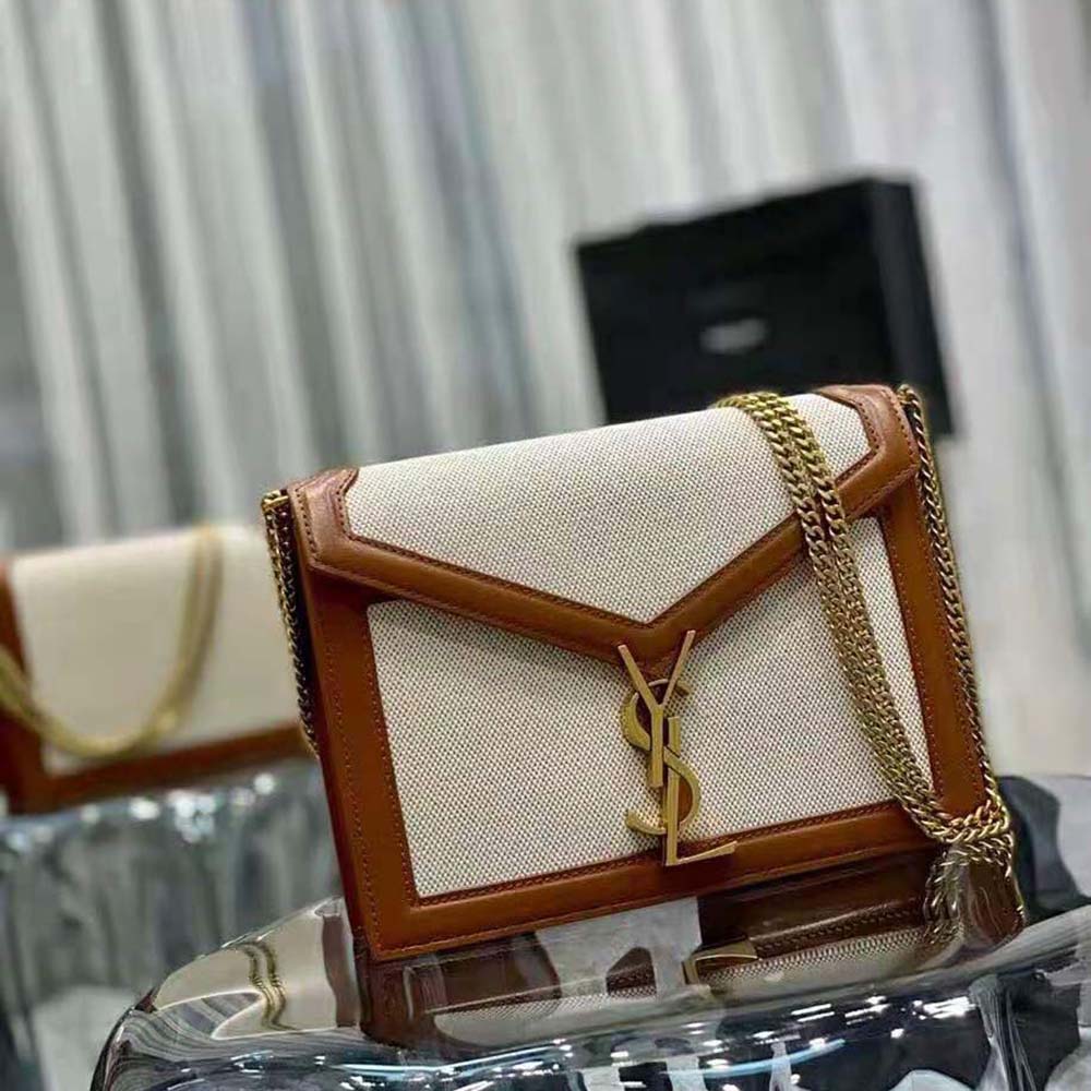 Side angle showing smooth leather trim on Saint Laurent YSL Cassandra bag
