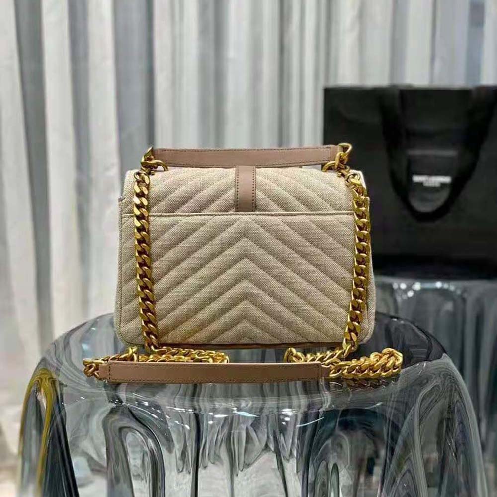 Side angle showing leather trim and shoulder strap of Saint Laurent YSL bag
