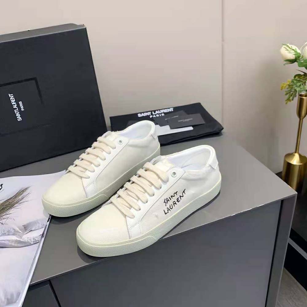 Top-down view of lace-up detail on Saint Laurent Court Classic SL/06 Sneakers
