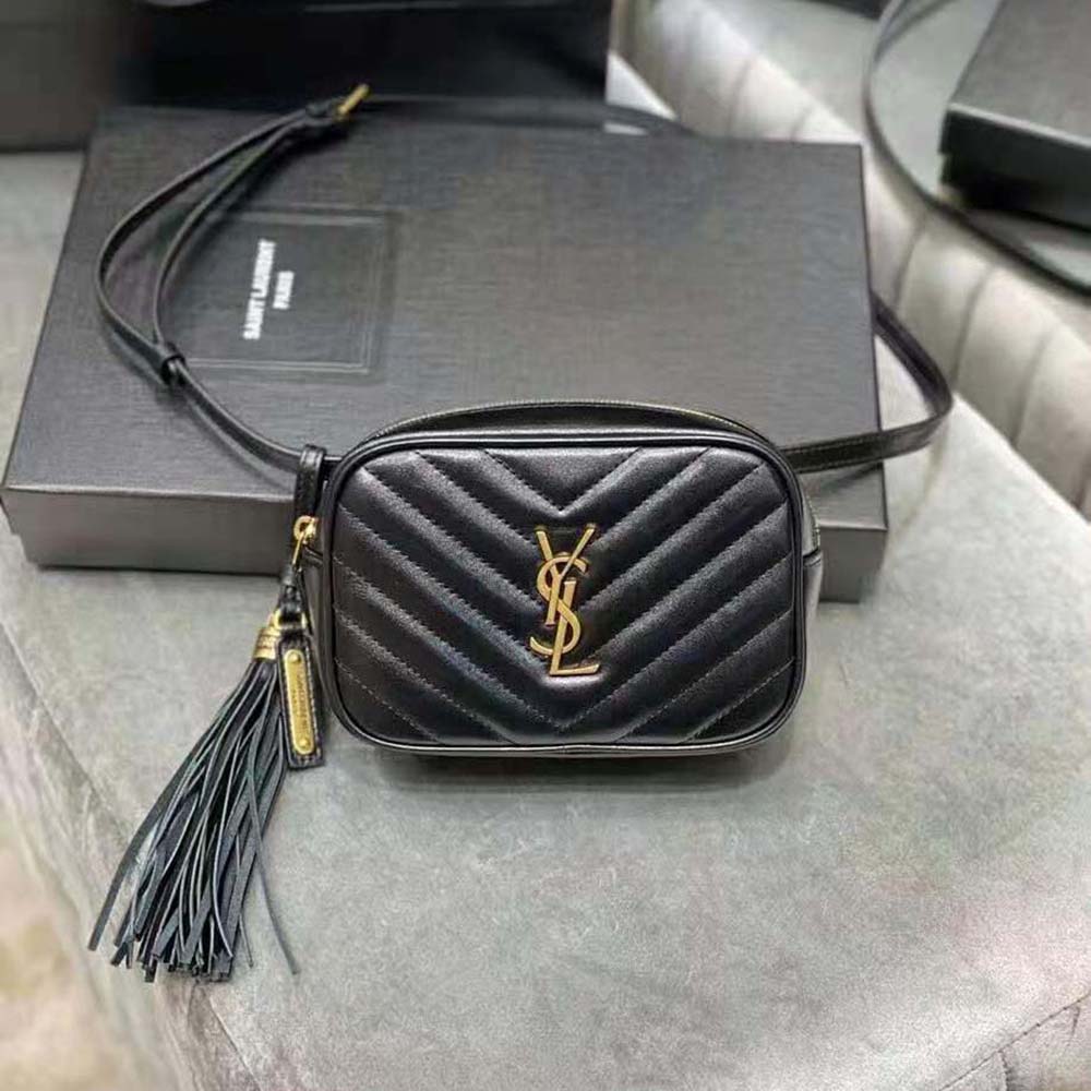 Close-up of gold YSL logo hardware on black Lou Belt Bag