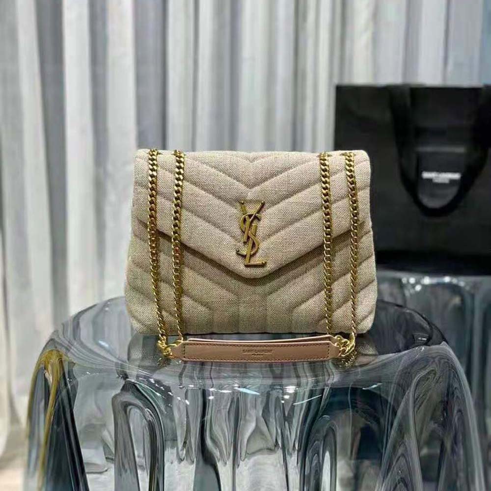 Side angle showing matelasse quilting on Saint Laurent YSL Loulou Small bag