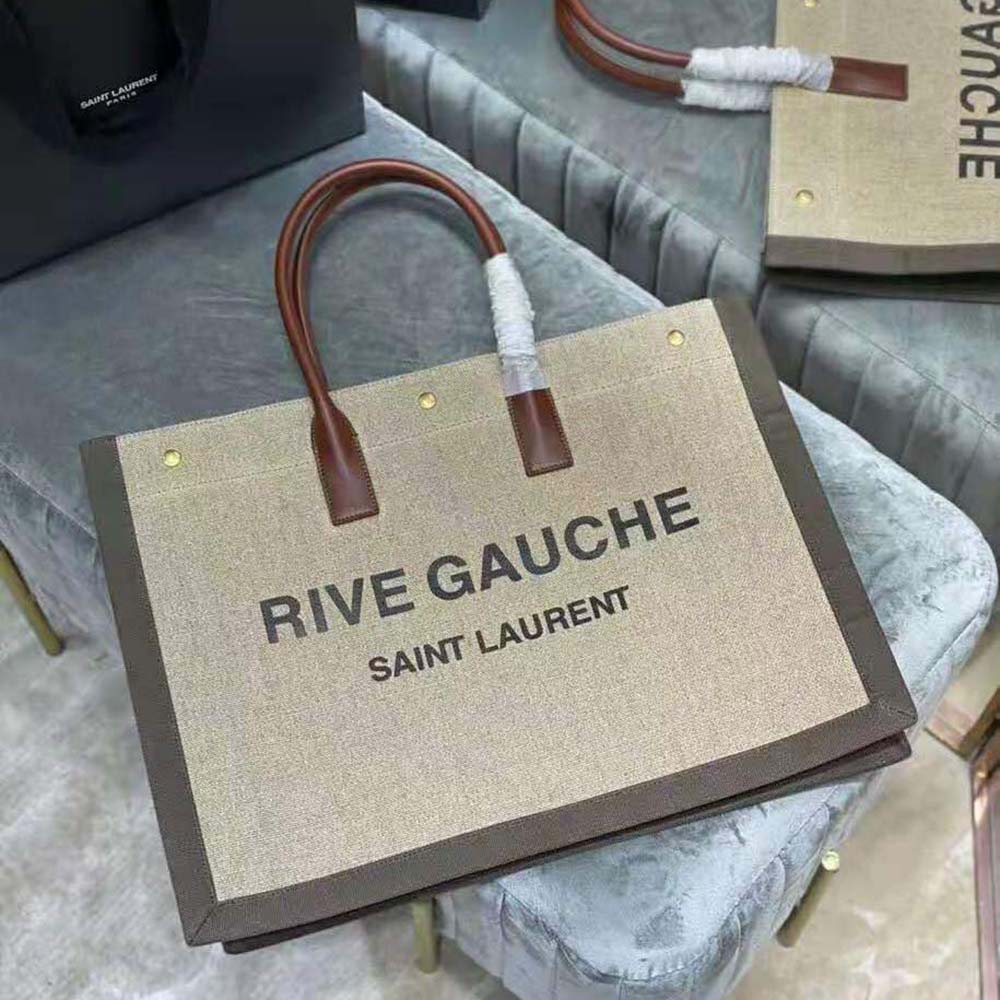 Close-up of gold YSL logo hardware on Rive Gauche Tote Bag