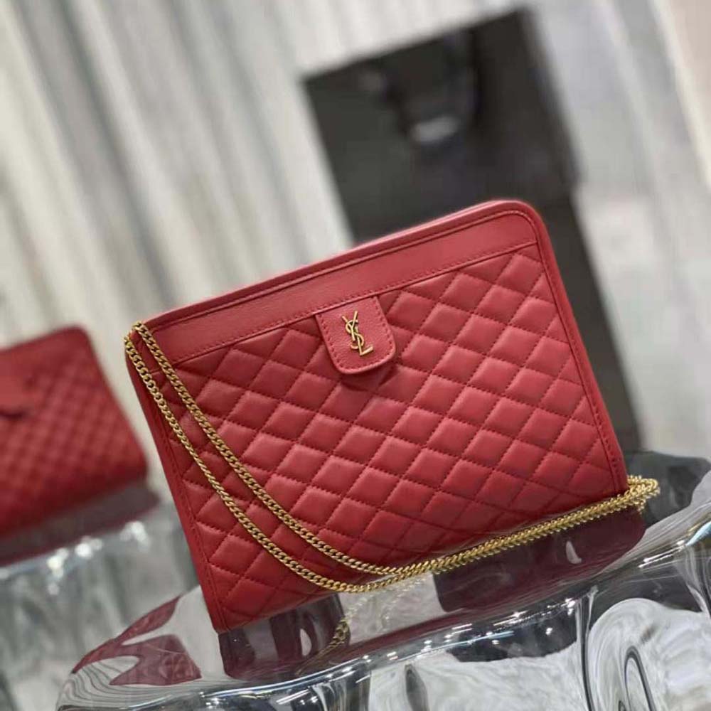 Side angle showing structured silhouette of Saint Laurent YSL Victoire Baby Clutch