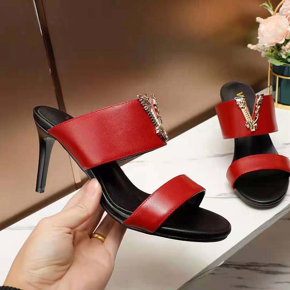 Side profile showing heel height of Versace Women Virtus Mules Red