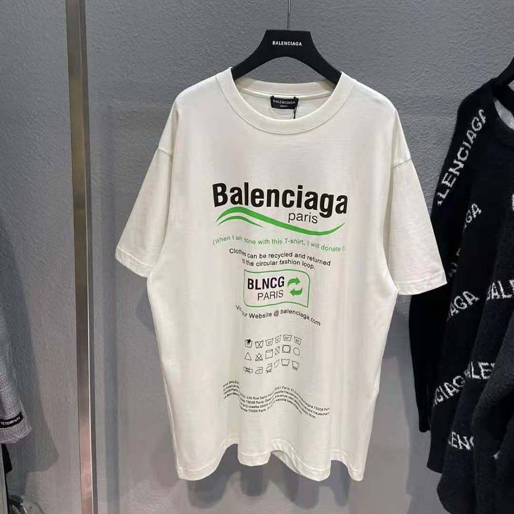 Close-up of green logo stitching on Balenciaga Women Dry Cleaning Boxy T-Shirt