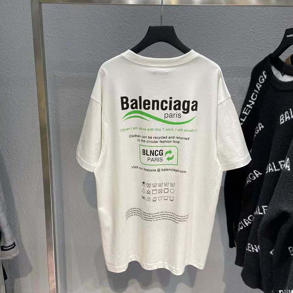 Side profile showing boxy fit of Balenciaga Women Dry Cleaning Boxy T-Shirt