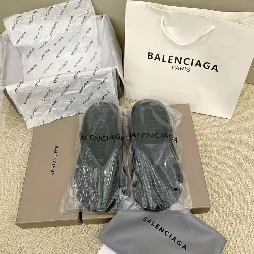 Close-up of molded rubber thong strap on Balenciaga sandal
