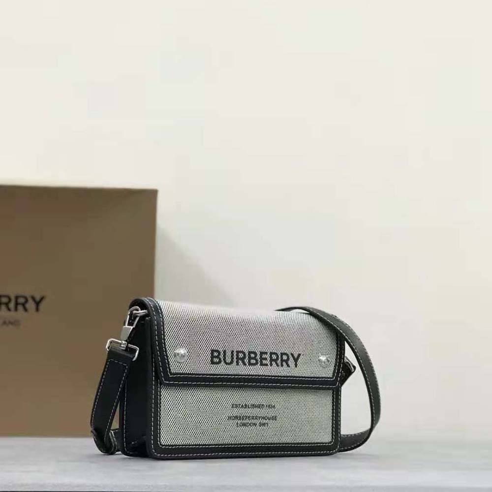 Side angle showing brushed metal hardware on Burberry Men Horseferry Print crossbody