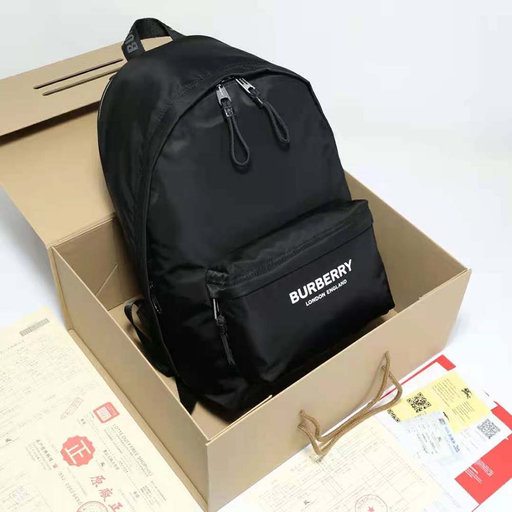 Side angle showing adjustable straps of Burberry Men Logo Print ECONYL Backpack-Black