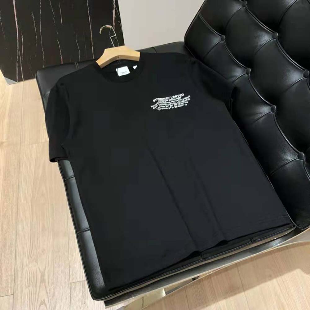 Close-up of Burberry location print detail on black cotton T-shirt
