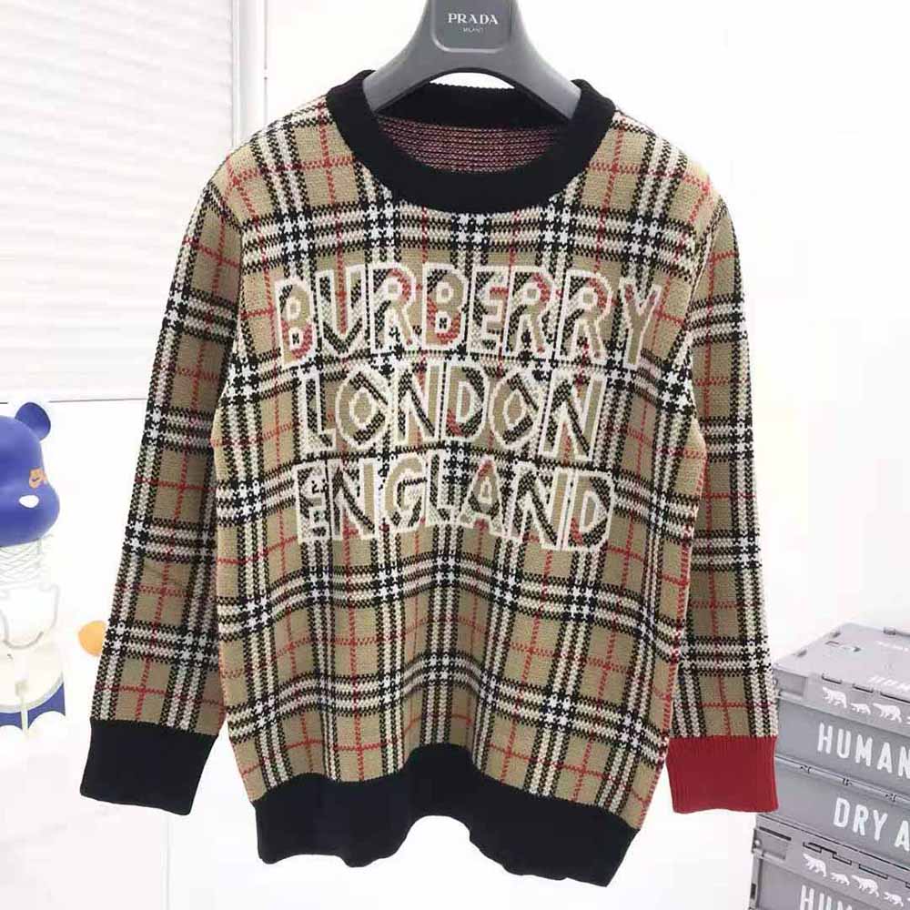 Side angle showing relaxed fit of Burberry Women Logo Check sweater