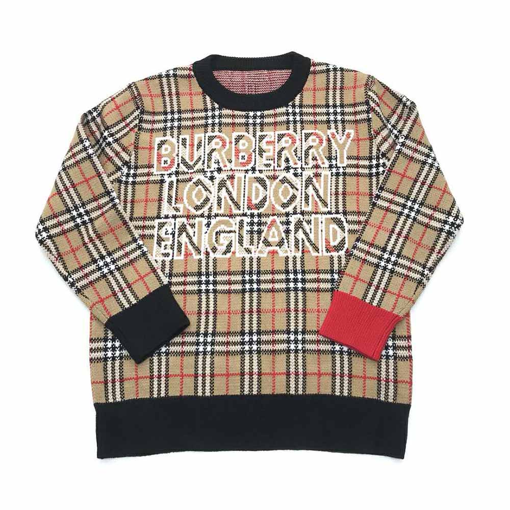 Close-up detail of signature Burberry logo check on sweater fabric