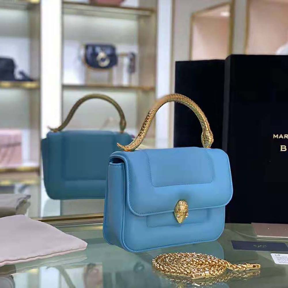 Side profile highlighting silhouette of Bvlgari Women Mary Katrantzou X Bvlgari Top Handle-Blue