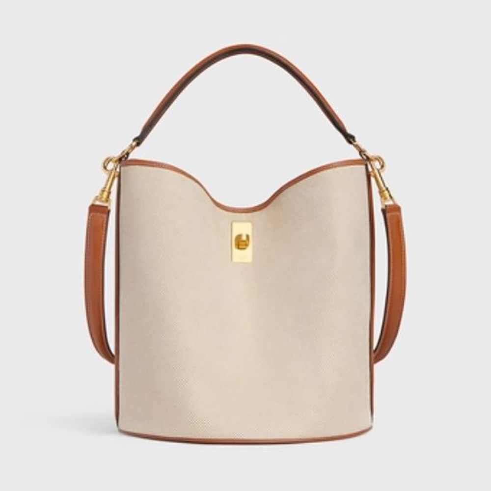 Front view of Celine Women Bucket 16 Bag in beige textile and calfskin