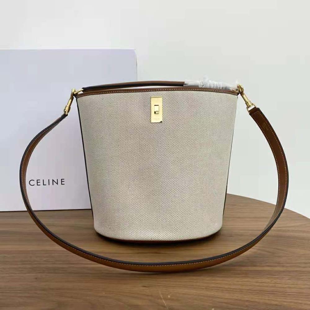 Side angle showing compact bucket silhouette of Celine Women Bucket 16 Bag