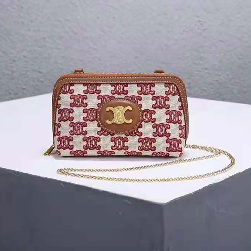 Close-up of maroon textile and gold Triomphe chain on Celine Women Clutch
