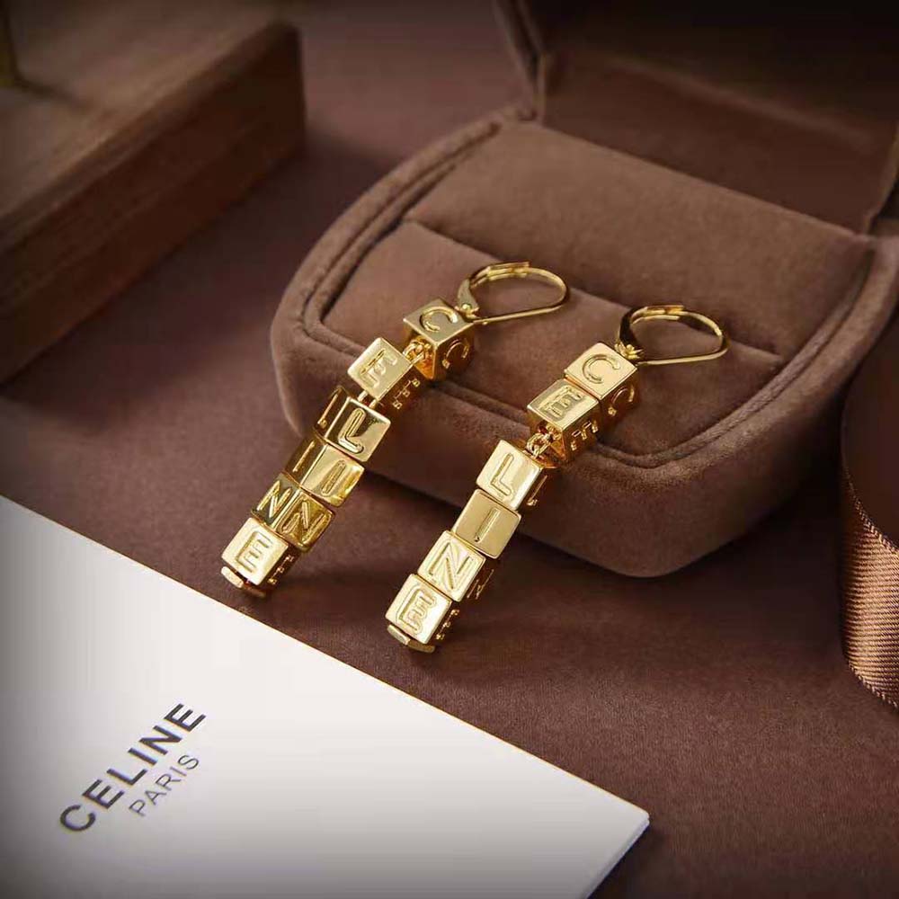 Side angle showing push-back closure of Celine Women Earrings in Brass