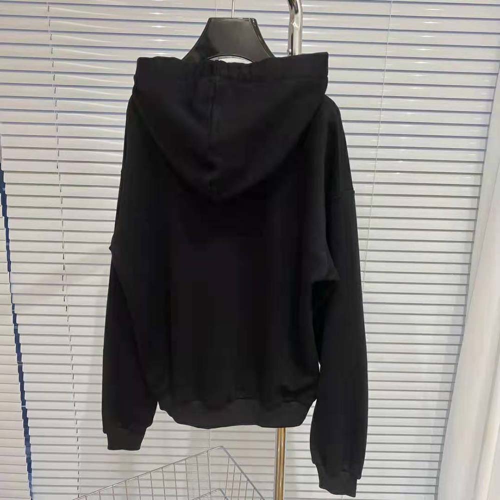 Side profile showing relaxed fit of Celine Women Loose Celine Sweatshirt in black
