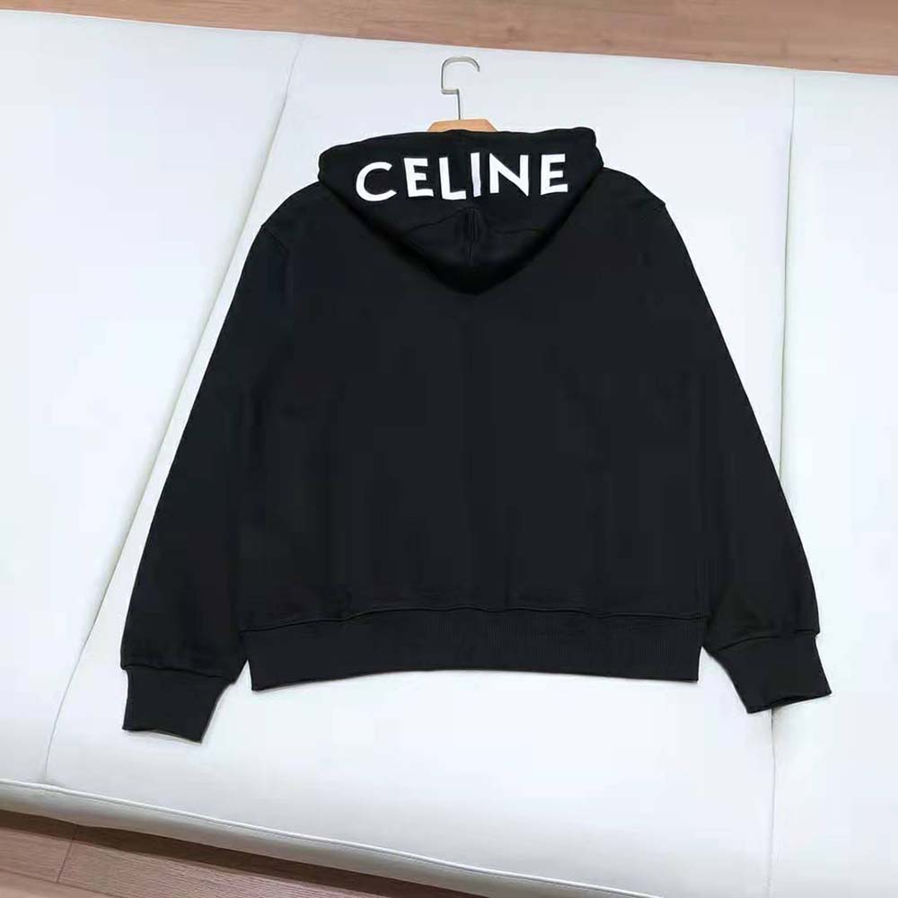 Side angle showing loose fit of Celine Women Loose Sweatshirt in Black