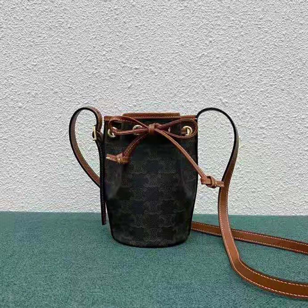 Close-up on drawstring and gold hardware of Celine Women Micro Drawstring bag