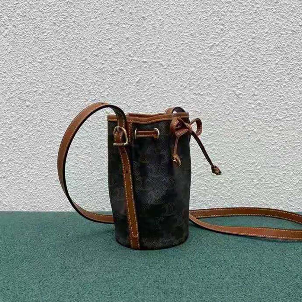 Side angle showing compact silhouette of Celine Women Micro Drawstring bag