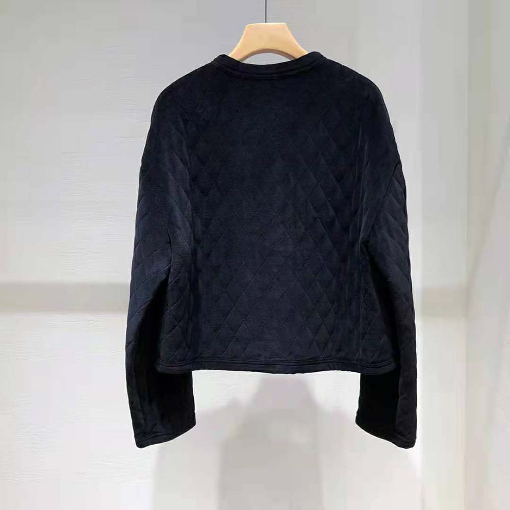 Side profile showing silhouette of Celine Women Quilted Cardigan in Velvet Jersey-Black