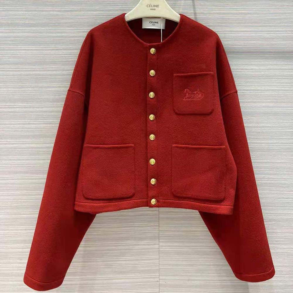 Close-up of snap button closure on Celine reversible cardigan