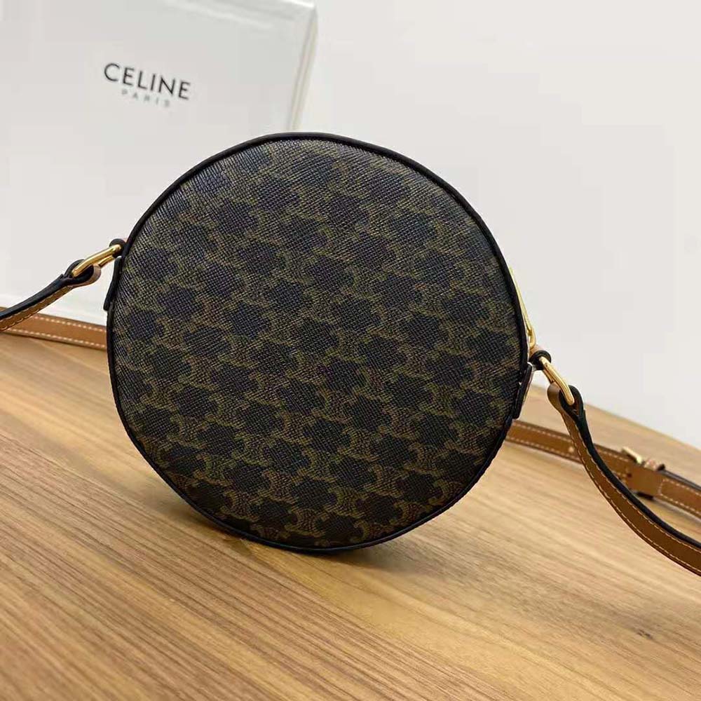 Side angle showing the adjustable strap and round silhouette of Celine purse