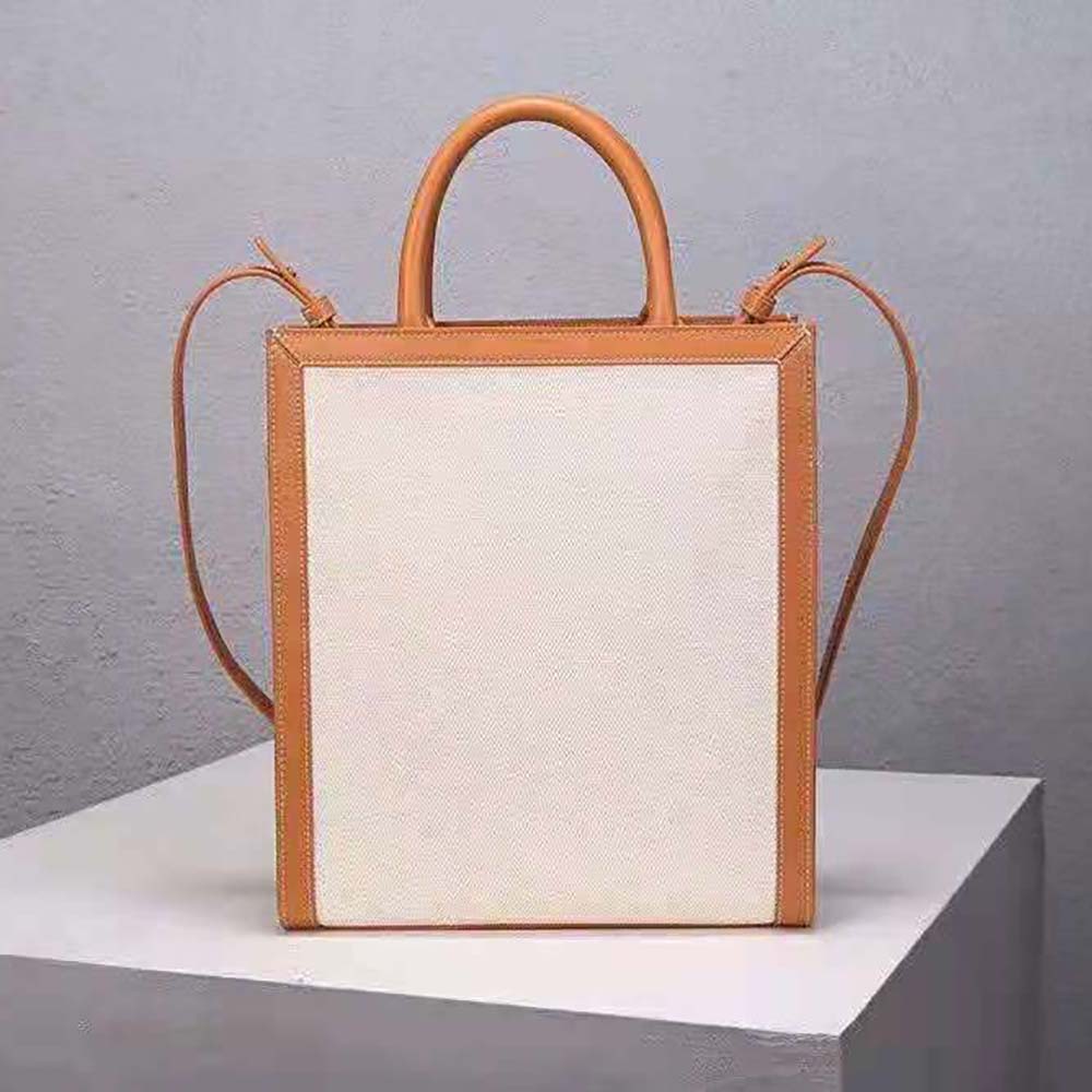 Side angle showing calfskin leather trim on Celine Women Small Vertical Cabas